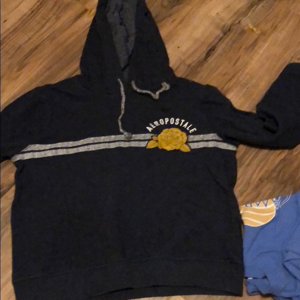 blue and yellow sweatshirt